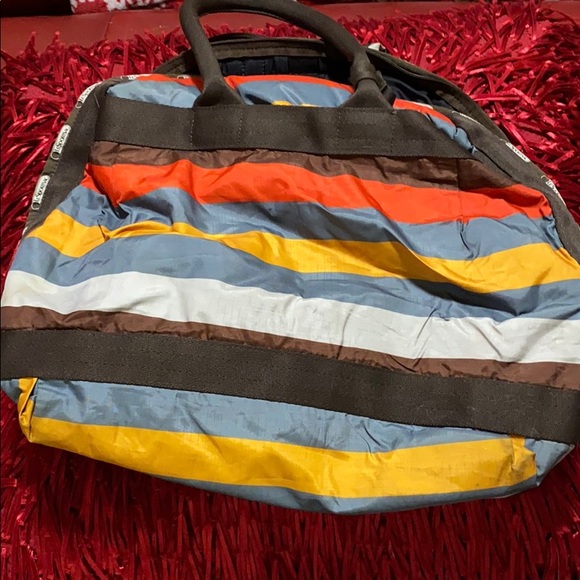Le sportsac striped book bag and luggage🥰🧡